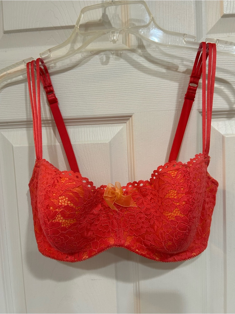 B.tempt’d Lace Underwire Balconette Bra with Bow Accent - Orange. 32DDD